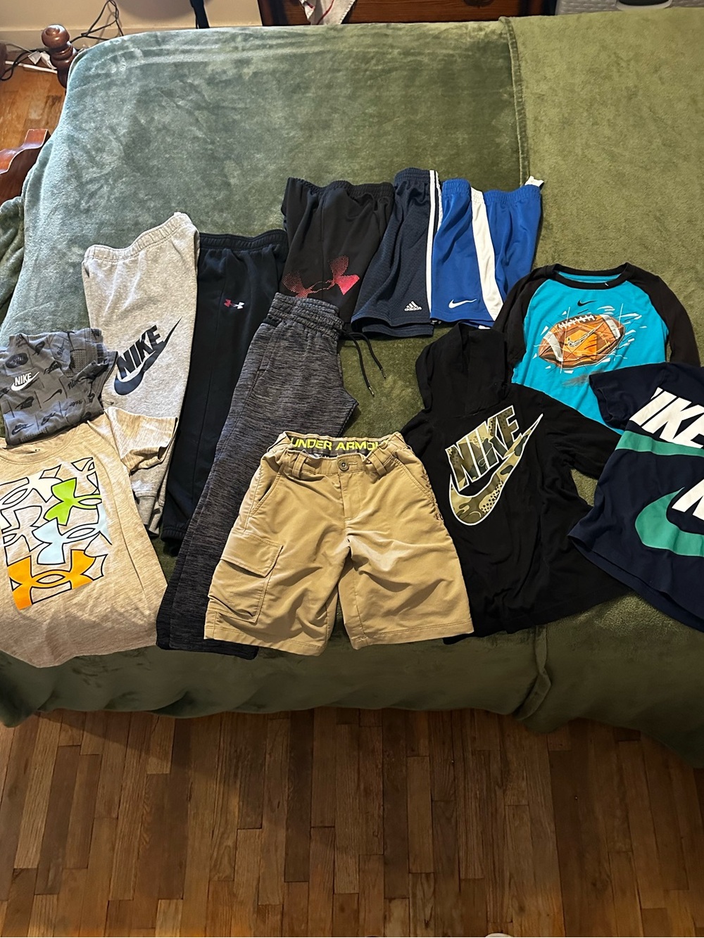 Size 7 boys bundle 3 pants, 4 shorts, 5 shirts.  Nike and under armor.